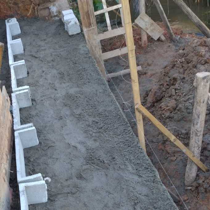 MURO DE ARRIMO COM PEDRA E PLACA DE CONCRETO – FORÇA E ESTABILIDADE PARA SUA OBRA